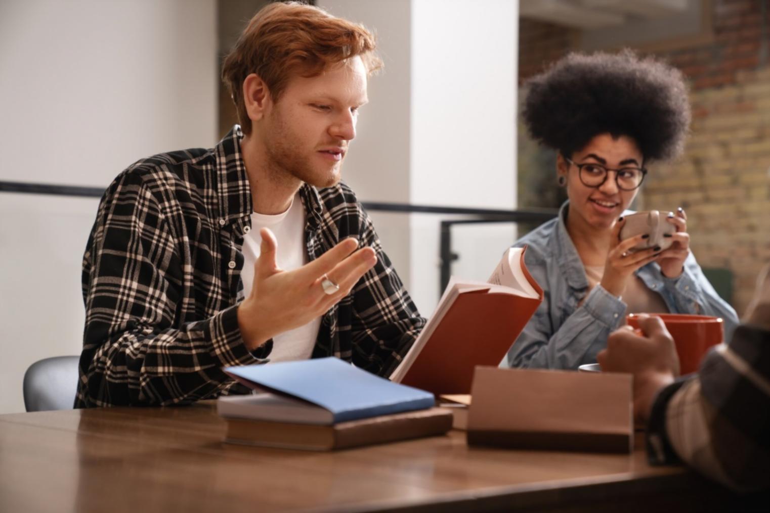 Instructor providing personalized feedback during finance workshop